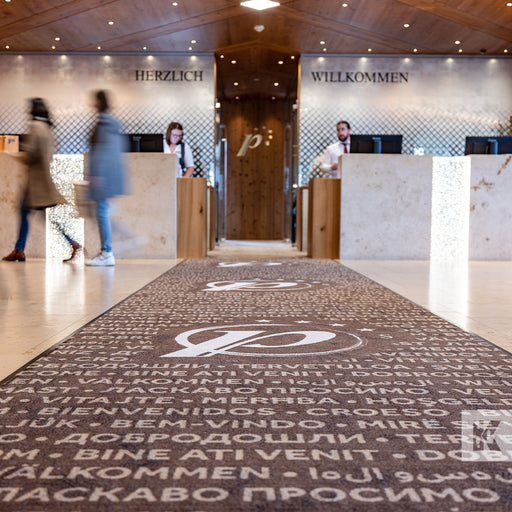 Jet-Print Horizon - Long brown printed mat leading to reception desks