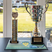 Counter Mat - Golfer's Delight logo on a printed mat with two golf related trophies