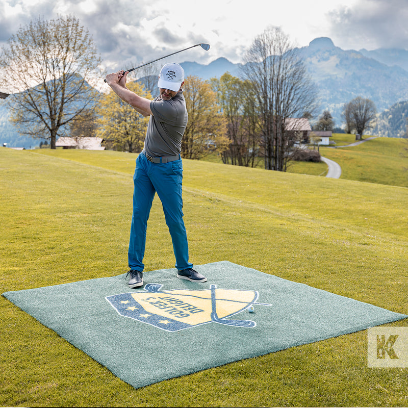 Jet-Print Outdoor - Golfer about to Tee-off from a printed golfing mat on a golf course