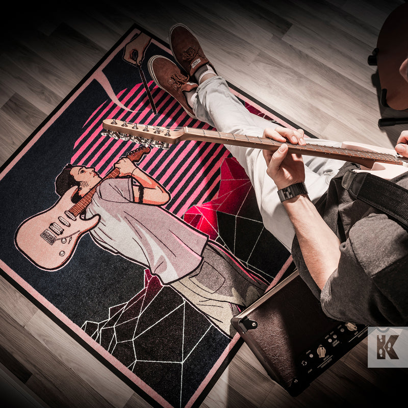 Jet-Print Velour - Music inspired printed mat design below a man playing an electric guitar