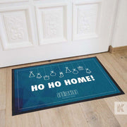 Jet-Print Velour - Ho Ho Home, example of a Christmas mat giveaway in front of a white door