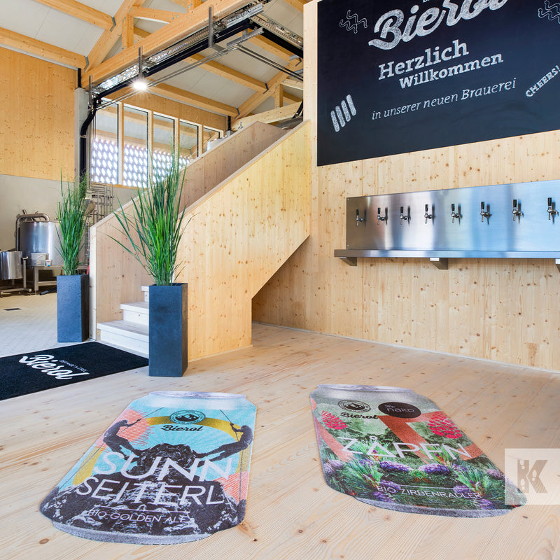 Jet-Print Vision - Bierol offices with printed floormats shaped like beer cans