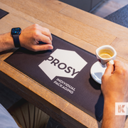 Counter Mat - Prosy mat with a person enjoying a coffee