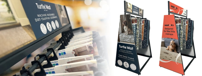Turtle Mat display stand with product packaging and promotional materials.