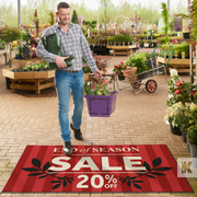 Jet-Print Mat - End of Season Sale message on a red mat in a garden centre with a customer carrying shopping