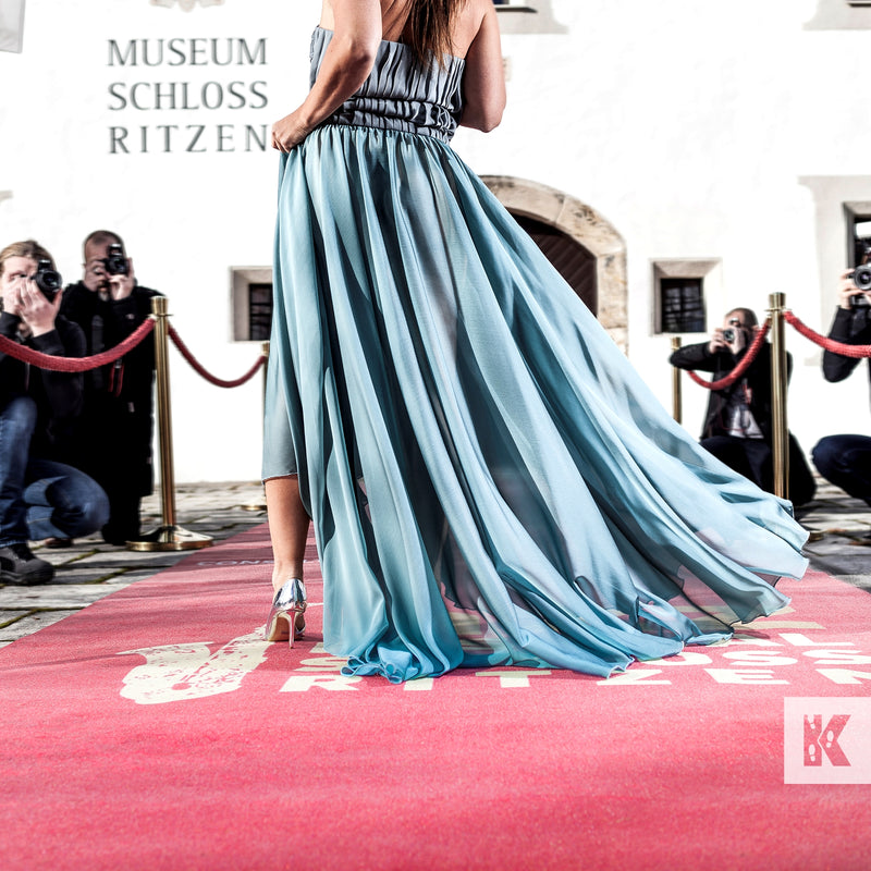 Jet-Print Event - Red carpet event with branded carpet and female celebrity walking across the mat and press photographers