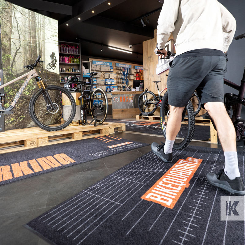 Bikequadrant logo on a custom designed floor mat