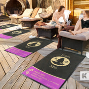 Jet-Print Patio - A row of relaxation loungers with promotional message mats, a young couple in swimwear enjoy a relaxed moment