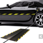 Kleen-Cable Mat EV - Charging cable held in place by a cable mat and an electric vehicle being charged