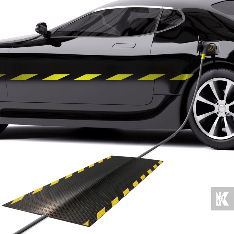 Kleen-Cable Mat EV - Charging cable held in place by a cable mat and an electric vehicle being charged