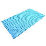 Light blue section of poolside matting