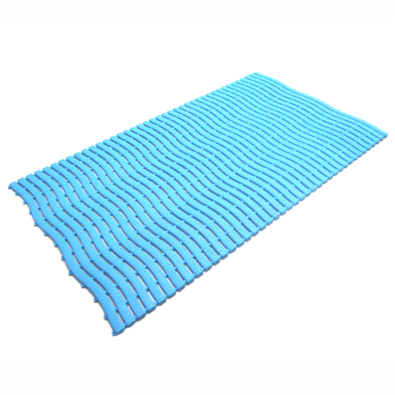 Light blue section of poolside matting