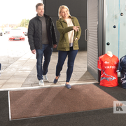 Iron-Horse - Black Brown - Couple walking across a mat as they enter a sports store