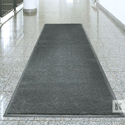 Iron-Horse - Midnight Grey - Mat positioned on a hard tiled floor in a modern store